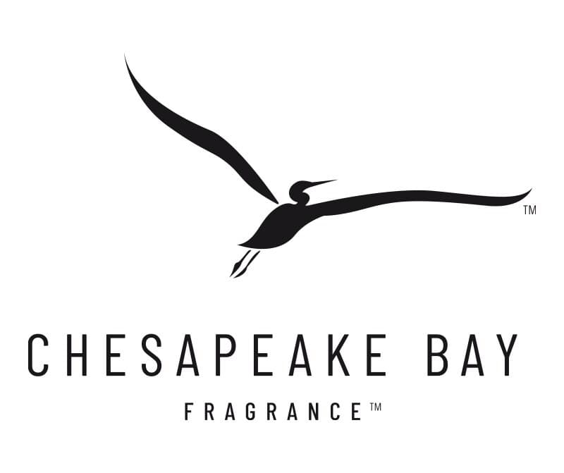 Stacked logo in black on white: a long-winged heron in flight above the words CHESAPEAKE BAY in tall spaced capitals, with FRAGRANCE centred in smaller letters below.