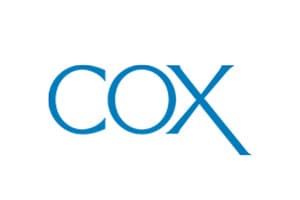 Flat wordmark logo on a white background reading COX in light blue letters.