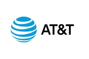 Flat corporate logo: a striped blue-and-white globe sphere beside the letters AT&T set in dark grey type on a white background.