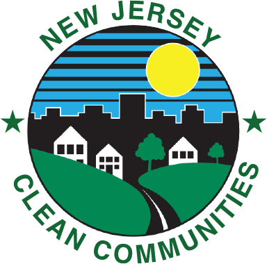 Round emblem showing a yellow sun over a black city skyline and green hills with houses and a winding road, ringed by "New Jersey Clean Communities"