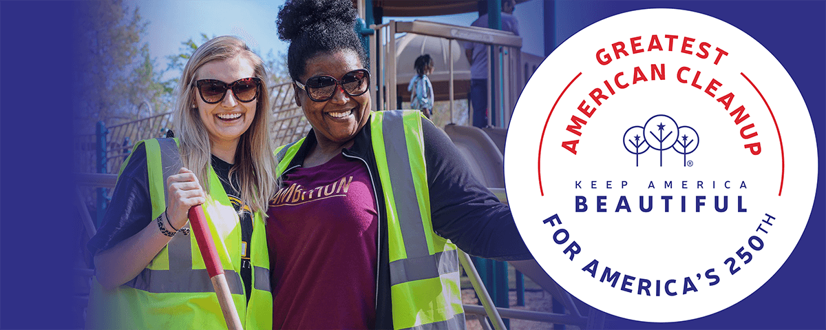 Banner artwork: two smiling women in yellow-green hi-vis vests and sunglasses stand by playground equipment, one holding a rake handle, next to the round GREATEST AMERICAN CLEANUP FOR AMERICA'S 250TH seal.