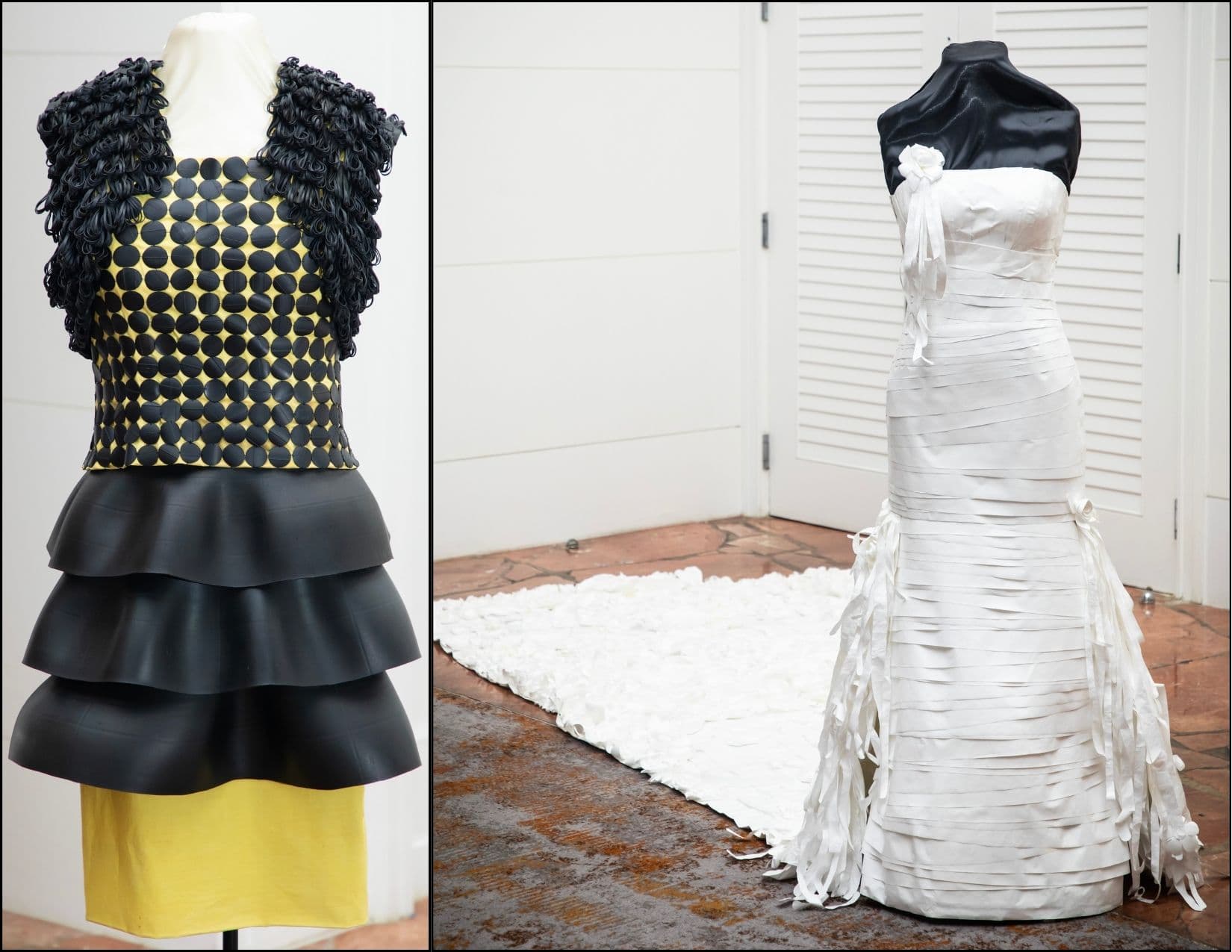 Two-panel display of upcycled garments: at left a dress with a bodice of black rubber discs over yellow and a tiered skirt of black rubber, at right a strapless white gown of layered paper strips with a long paper train on the floor.