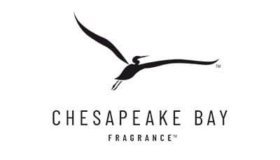 Black-and-white logo showing a long-billed heron in flight with outstretched wings, above the words CHESAPEAKE BAY and, smaller beneath, FRAGRANCE.
