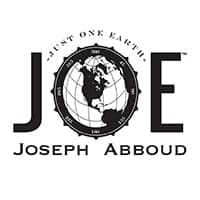 Black-and-white logo: the letters J and E flanking a line-drawn globe of the Americas ringed by the words JUST ONE EARTH, with JOSEPH ABBOUD in spaced capitals underneath.